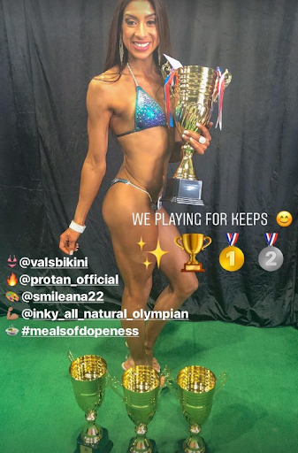 Latina Bikini Body Builder wins large trophy