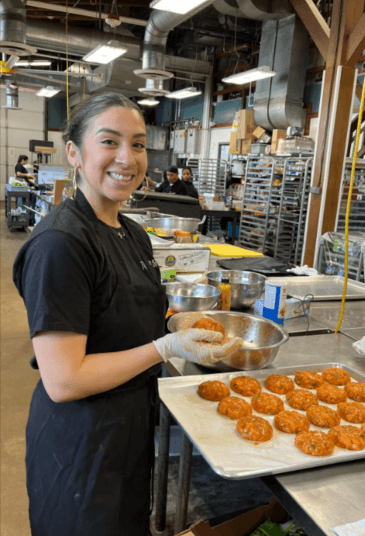 happy christina making salmon cakes